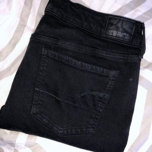 Distressed black skinny jeans from American Eagle.